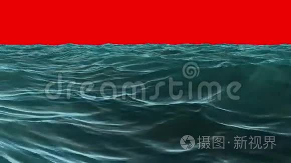 红幕天空下波涛汹涌的蓝色海洋