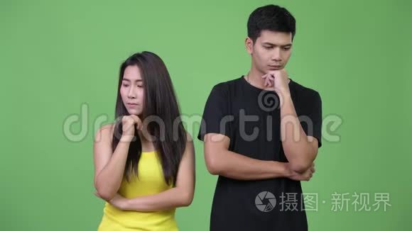 年轻悲伤的亚洲夫妇在一起思考视频
