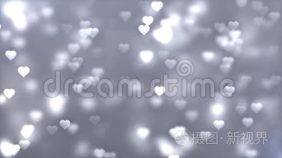 白色灰色的心浪漫的旋转发光的爱心彩色粒子