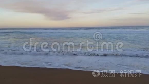 海浪在海滩海景日落海洋视频