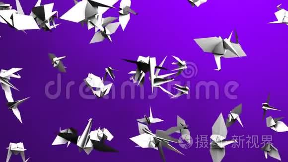 紫色背景上的折纸鹤视频