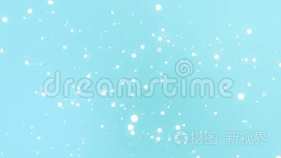 白色的雪花在蓝色的背景下飘落下来