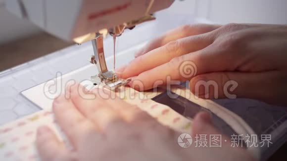 缝纫机针在织物上的特写视频