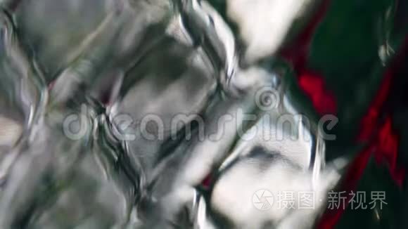 菱形花纹玻璃表面抽象颜色反射视频